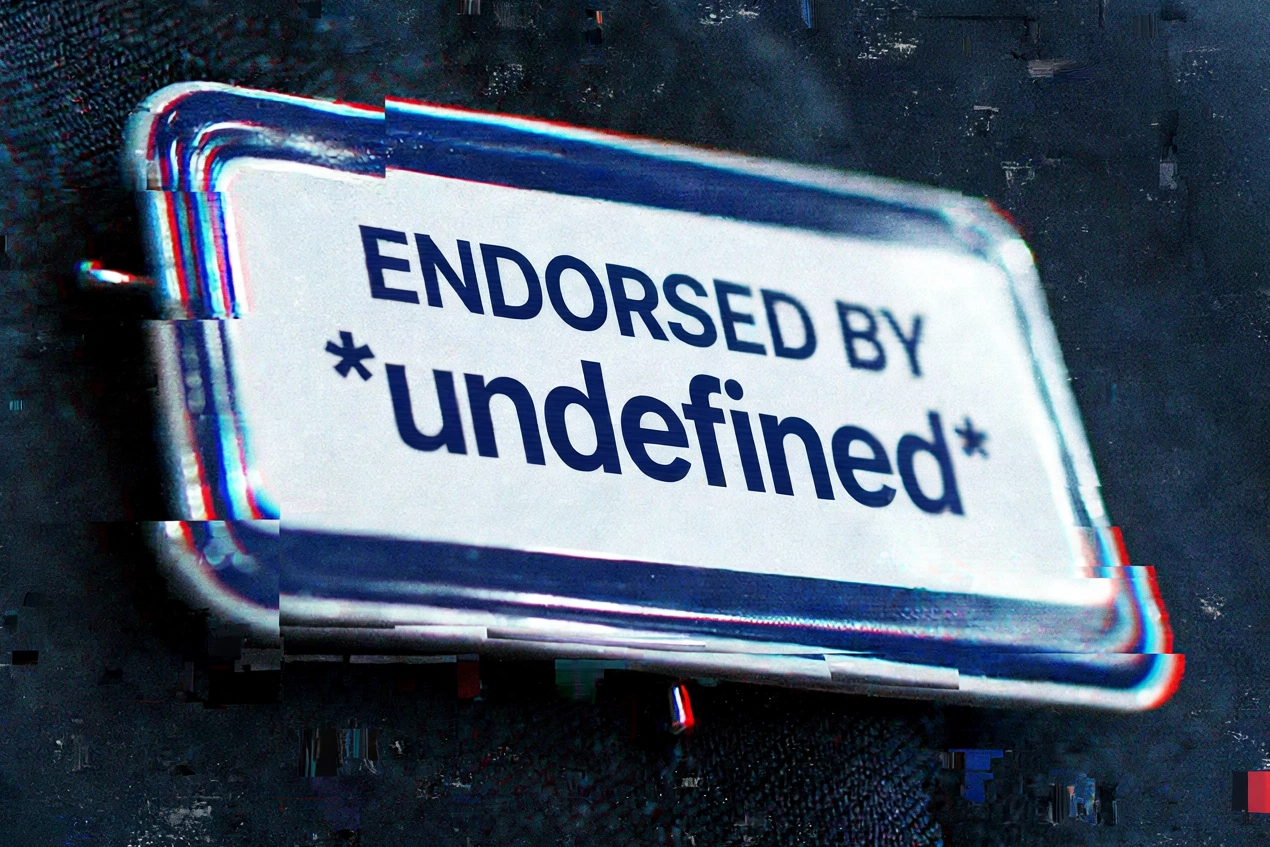 Close-up of a candidate&rsquo;s suit lapel wearing a campaign badge that reads &lsquo;ENDORSED BY *undefined*&rsquo; &mdash; like a software error where the endorser&rsquo;s name failed to load